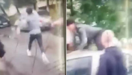 В Гомеле футбольный фанат прыгал по машине, друзья снимали на видео